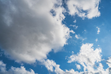 Cumulus clouds in a blue sky