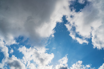 Cumulus clouds in a blue sky