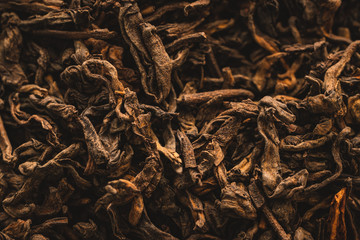 Macro detail of dried black tea leaves