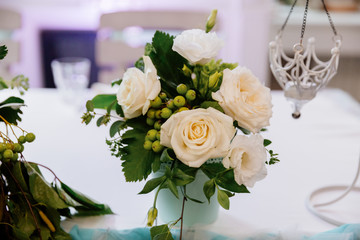 Table decor with flowers for a wedding party