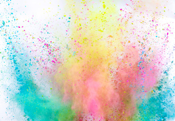 Fototapeta na wymiar Launched colorful powder on white background, freeze motion