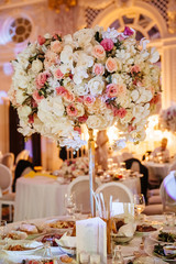 Luxury table decor with flowers for a wedding party