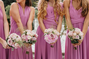 Wedding bouquets in bridesmaids hands