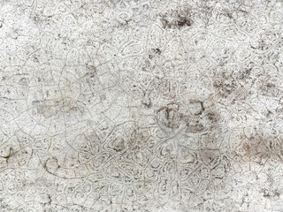 Gray  wall with cracks And there is moss growing between the cracks. Background or texture. grunge gray abstract background.