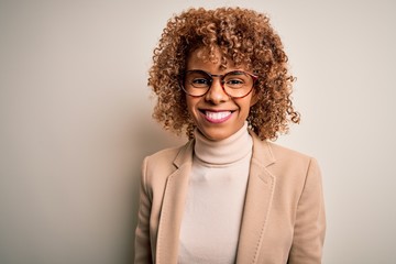 Beautiful african american businesswoman wearing glasses over isolated white background with a happy and cool smile on face. Lucky person.