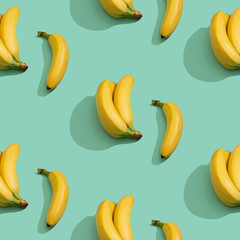 Bananas pattern on the green background