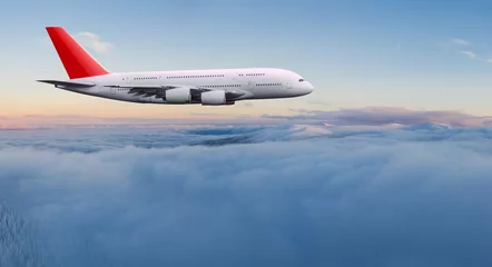 Rolgordijnen Commercial airplane jetliner flying above dramatic clouds in beautiful light. Travel concept. © Lukas Gojda