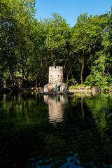 Fototapeta na wymiar Ancient tower in the park of the Palacio de Pena.