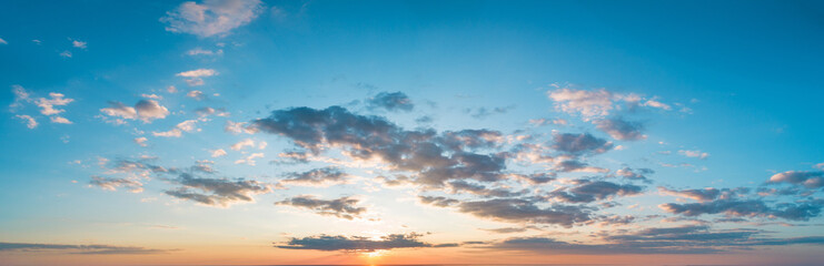 Obraz premium Sunset sky with multicolor clouds