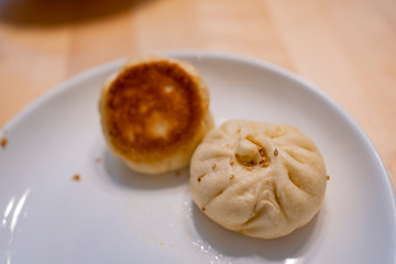 Close up shot of the  homemade Shui Jian Bao