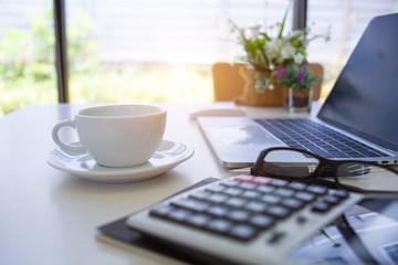 top viweAccounting equipment is placed on the desk in the house to reduce meeting people according...