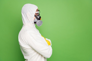 Close-up profile side view portrait of his he nice content professional disinfectant wearing gas...