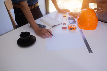 group of Engineer and Architect Brainstorming discuss project  at Construction Site with...