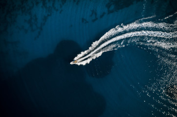 Speed boat in mediterranean sea, aerial view