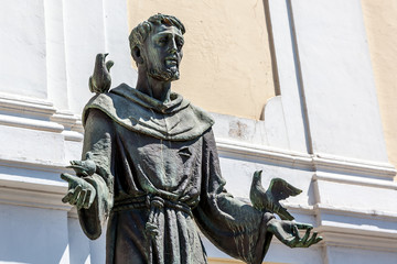 Statue of Saint Francis of Assisi - obrazy, fototapety, plakaty