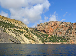 Fototapeta na wymiar Black sea colorful rocks in summer in Crimea 