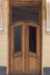 Legacy old-fashioned front door on the entrance wall.