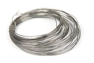 Stainless steel wire roll on a white background