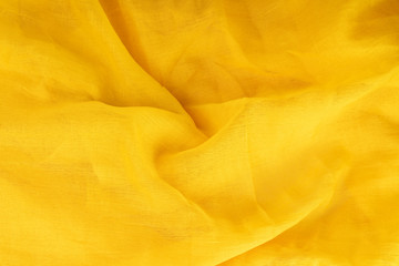 Texture of bright yellow fleece fabric material for sewing.