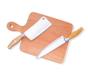 Natural wooden cutting board with a knife, kitchen tools.
