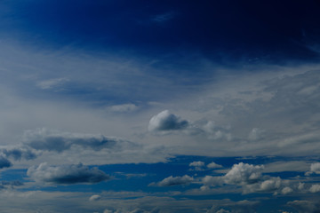 blue sky with clouds at noon