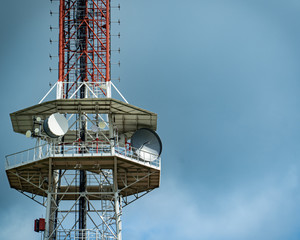 Picture of the signal transmission tower, visible plates transmitting the signal.