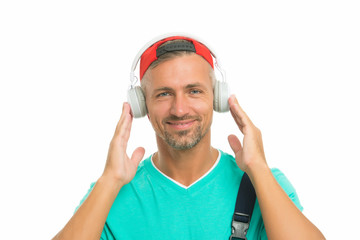 Only music that matters. Happy man listen to music isolated on white. Handsome guy wear headphones playing music. New technology. Modern life. Music helps me escape from the reality I live in