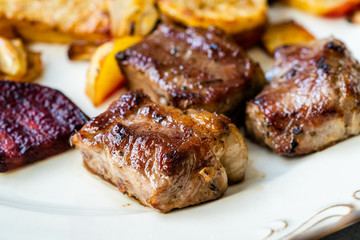 Lamb Steak with Roasted Baked Beet Slices and Potatoes / Turkish Kuzu Lokum or Delight served with Plate.