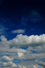 blue sky with clouds at noon