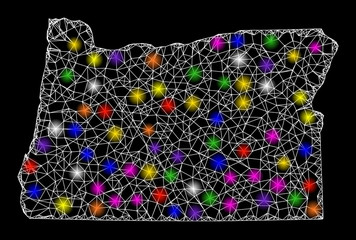 Web mesh vector map of Oregon State with glare effect on a black background. Abstract lines, light spots and dots form map of Oregon State constellation.