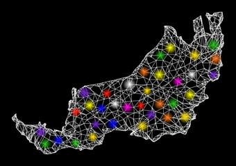 Web mesh vector map of Sarawak with glare effect on a black background. Abstract lines, light spots and small circles form map of Sarawak constellation.