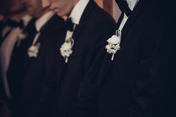 black, boutonniere, celebration, closeup, dress, elegant, fashion, floral, flower, groom, groomsmen, guy, jacket, lifestyle, luxury, male, man, people, rose, suit, wedding, wedding day, young