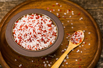 Chili Spicy Sea Salt on Wooden Background. Selective focus.