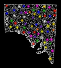 Web mesh vector map of South Australia with glare effect on a black background. Abstract lines, light spots and circle dots form map of South Australia constellation.