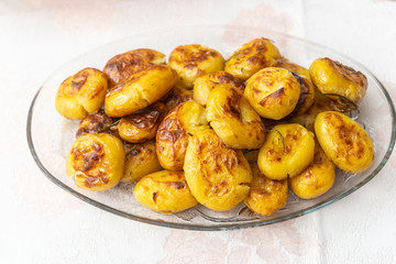 Homemade baked young potatoes