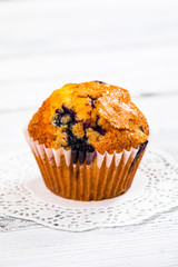 Muffins with Blueberries and Fresh Blueberries. Selective focus.