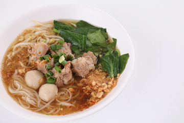 Local Thai food , Noodle with meat ball and pork isolated in white background