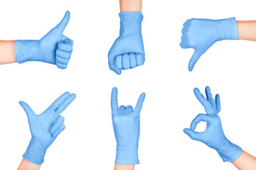 Set of Hand gestures in blue disposable latex surgical gloves isolated on white background.