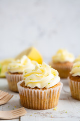 Lemon and poppy seed cupcakes with cheese cream frosting