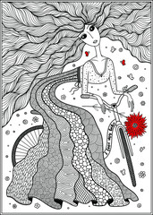   Girl in a beautiful dress on a bicycle.