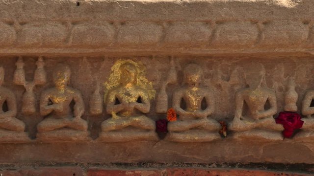 Statues of Buddha in holy place Sarnath, Varanasi, India, 4k footage video