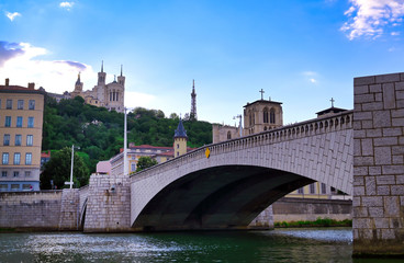 Obraz premium The Basilica of Notre Dame de Fourviere overlooking Lyon, France and the Saone River.