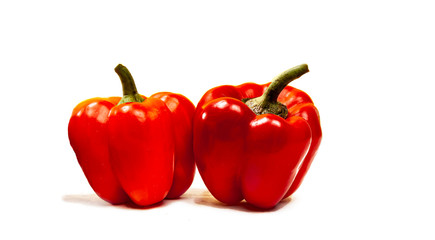 Composition of isolated fresh harvest Bulgarian pepper on a wtite backround