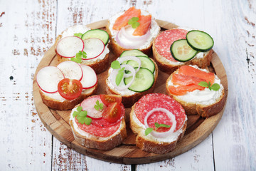 Top view on different sandwiches, flat lay	