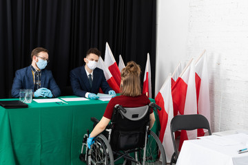 A young adult in a wheelchair came to the polling station to vote for president in the elections in Poland.