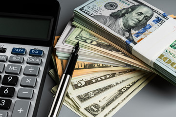 Fototapeta premium American Dollars with Calculator