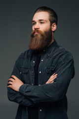 Attractive long beard man hands crossed isolated grey background