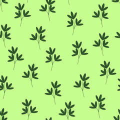 Pattern green leaves on a light green background