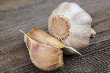 Fresh garlic fruit on a wooden board