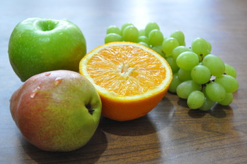 still life with fruit on a wooden table